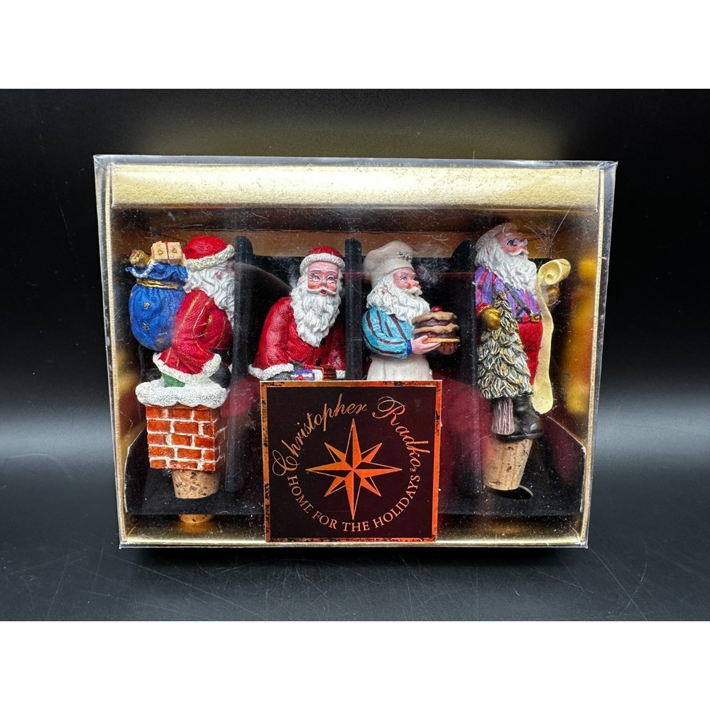 CHRISTOPHER RADKO BOTTLE/WINE STOPPERS SANTAS‎